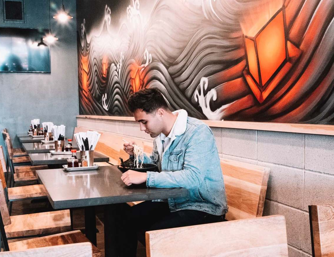 guy eating ramen
