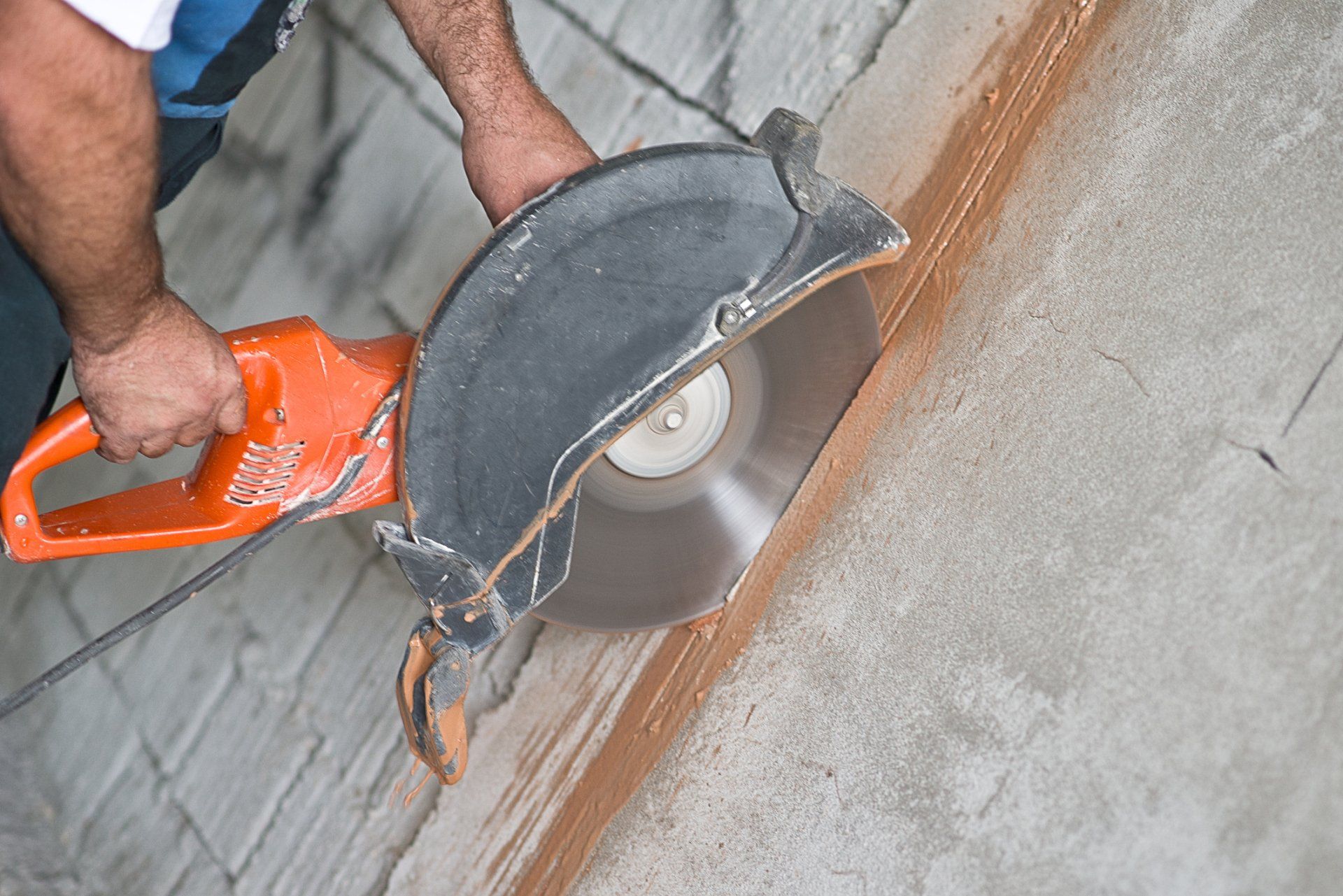 Man Working In Cutting Concrete — Houston, TX — Jasso Sawing & Sealing