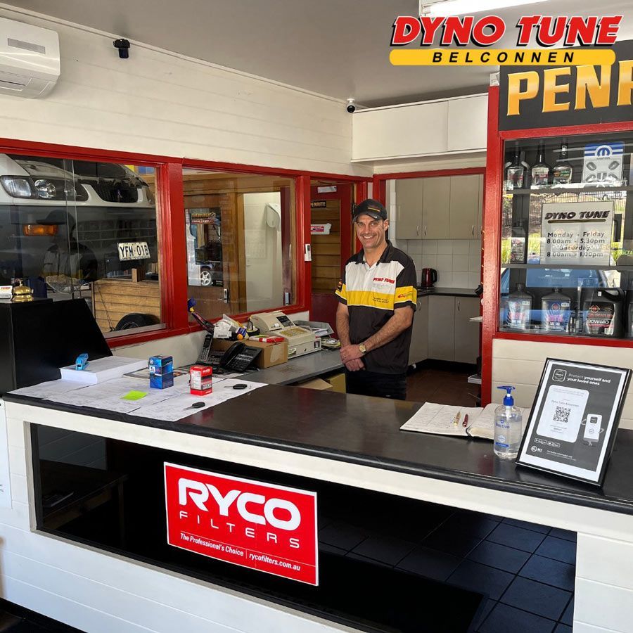 Man Smiling Inside The Workshop — Mechanic In Belconnen, ACT
