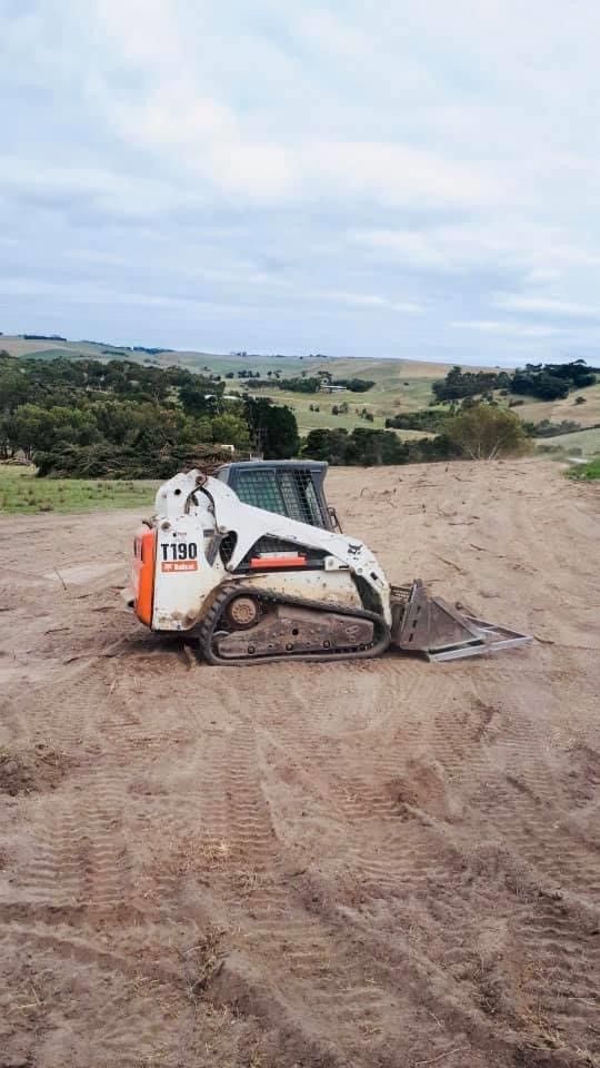 Two White Heavy Equipment Machines Doing Some Earthwork | Geelong, Vic | Don Barry’s Bobcat Hire