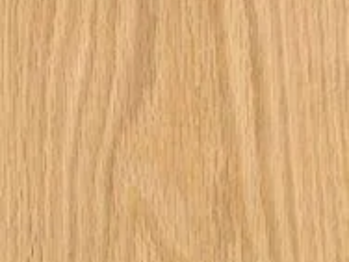Close-up of light brown wood grain, showing vertical lines and natural texture.