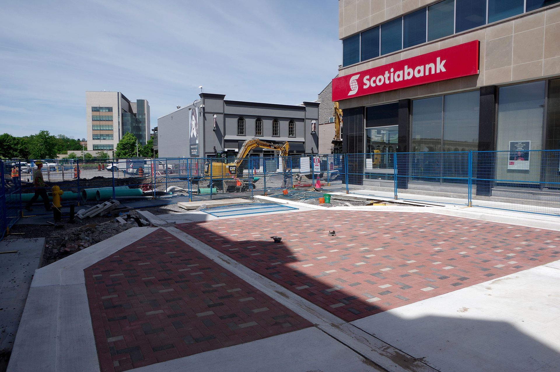 A large building with a red sign that says santa bank on it.