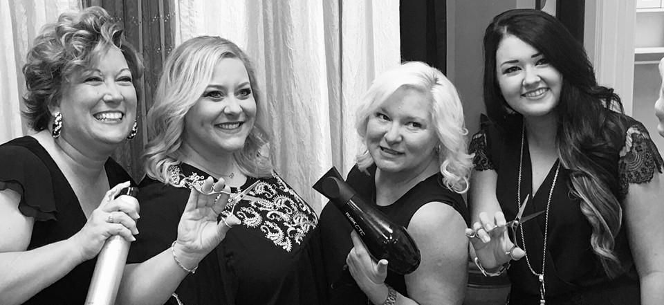 black and white photo of hair stylists