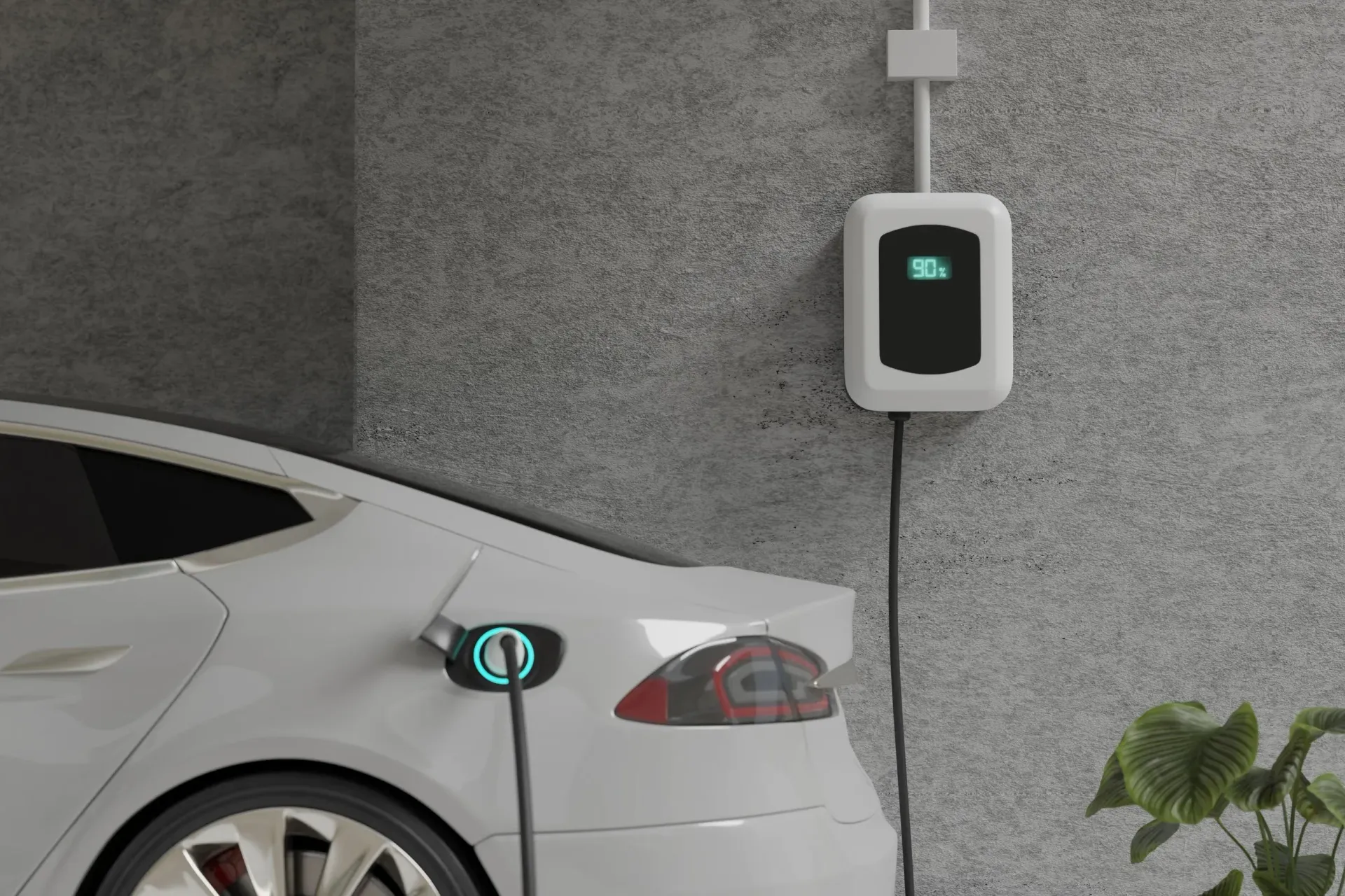 White electric car charging at a home charging station on a grey wall — L & K Electrical & Air Conditioning in Uralla, NSW