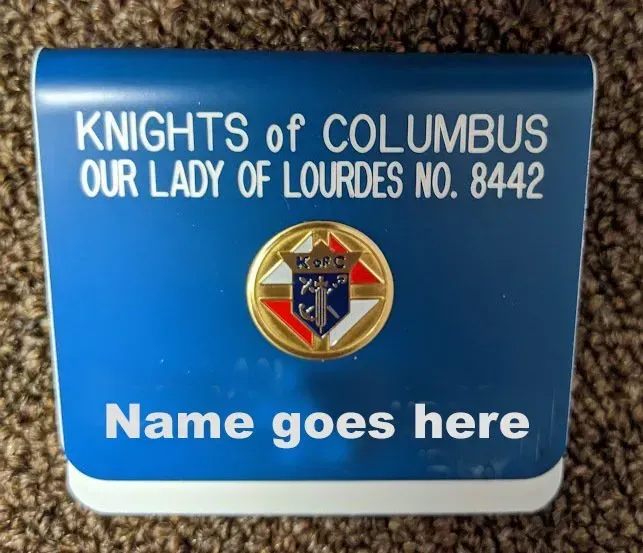 A blue sign that says knights of columbus on it