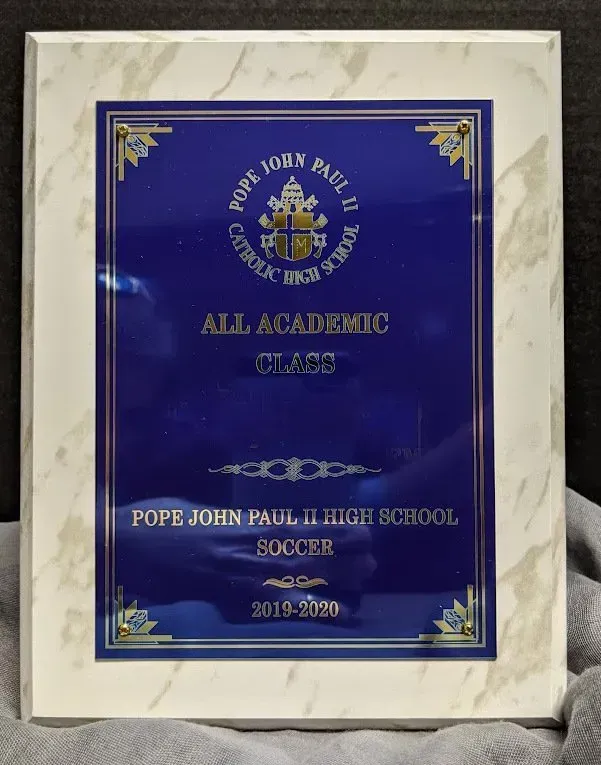 A plaque that says all academic class on it