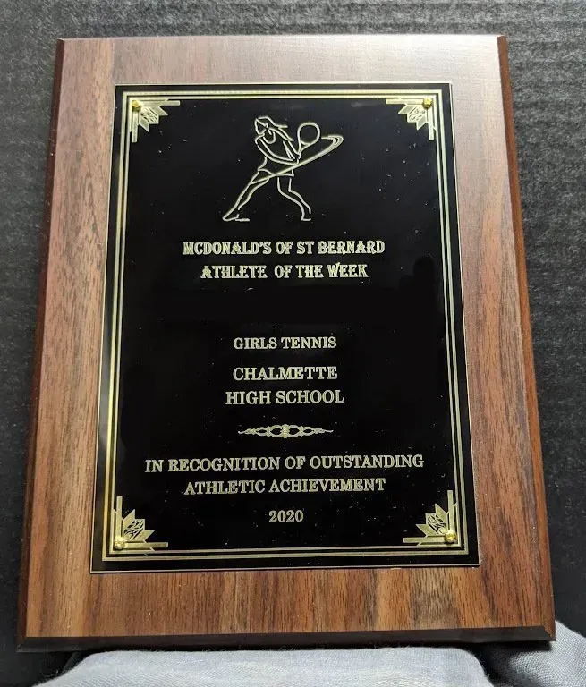 A plaque that says mcdonald 's of st bernard athlete of the week