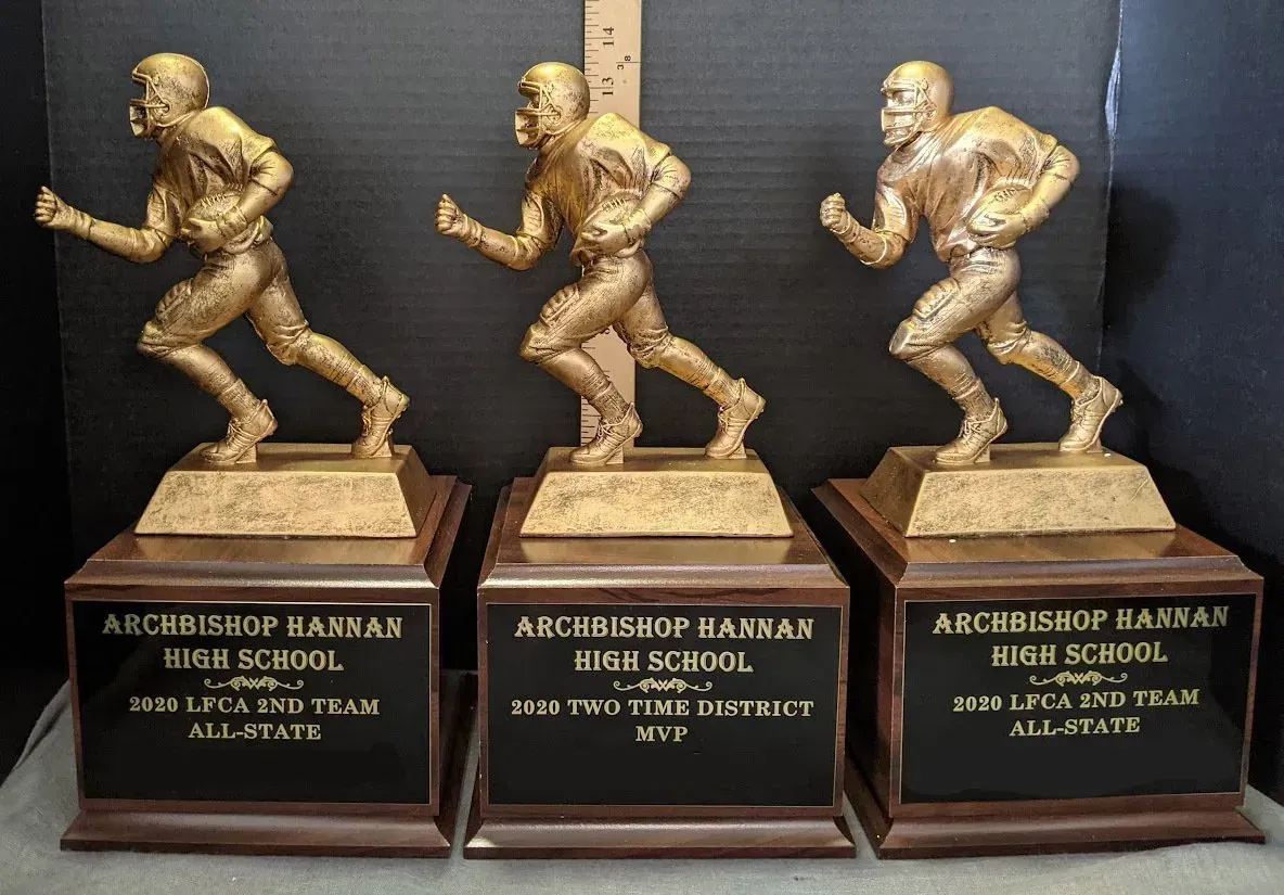 Three football trophies for archeshop barrar high school