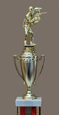 A gold trophy with a statue of a man on top of it.