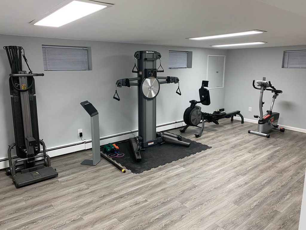 There are many different types of exercise equipment in this room