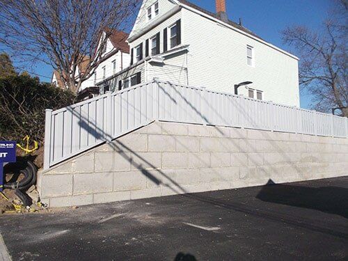 A house with PVC fence—Security Fence in Bronx, NY