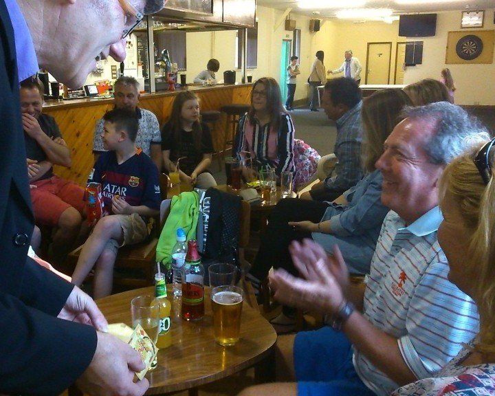 The magician doing close up magic