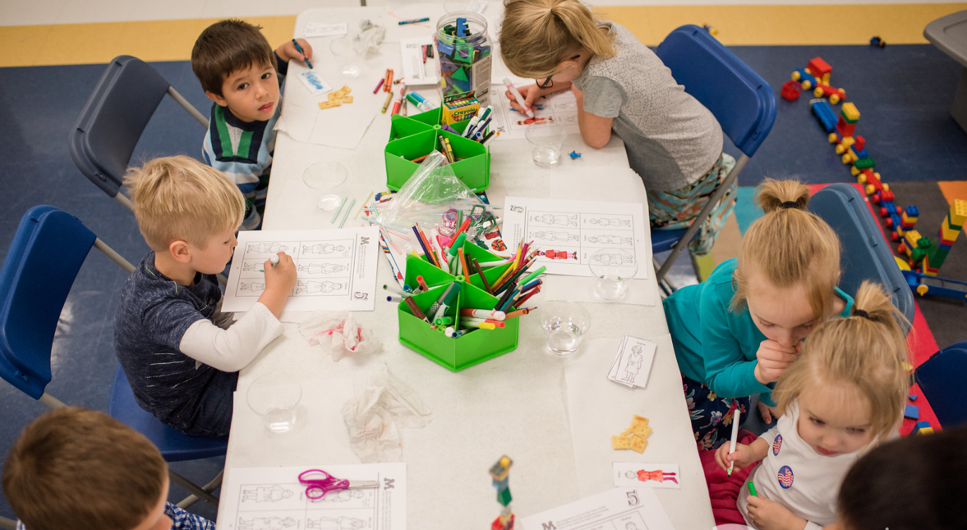Kids at the table in the Hope Creek Kids class