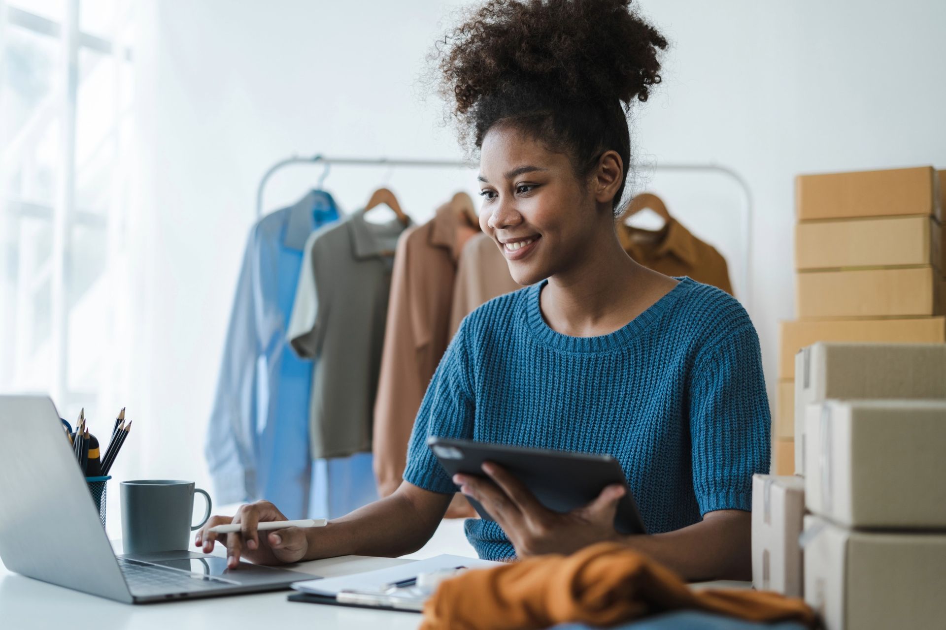 Business owner looking at laptop