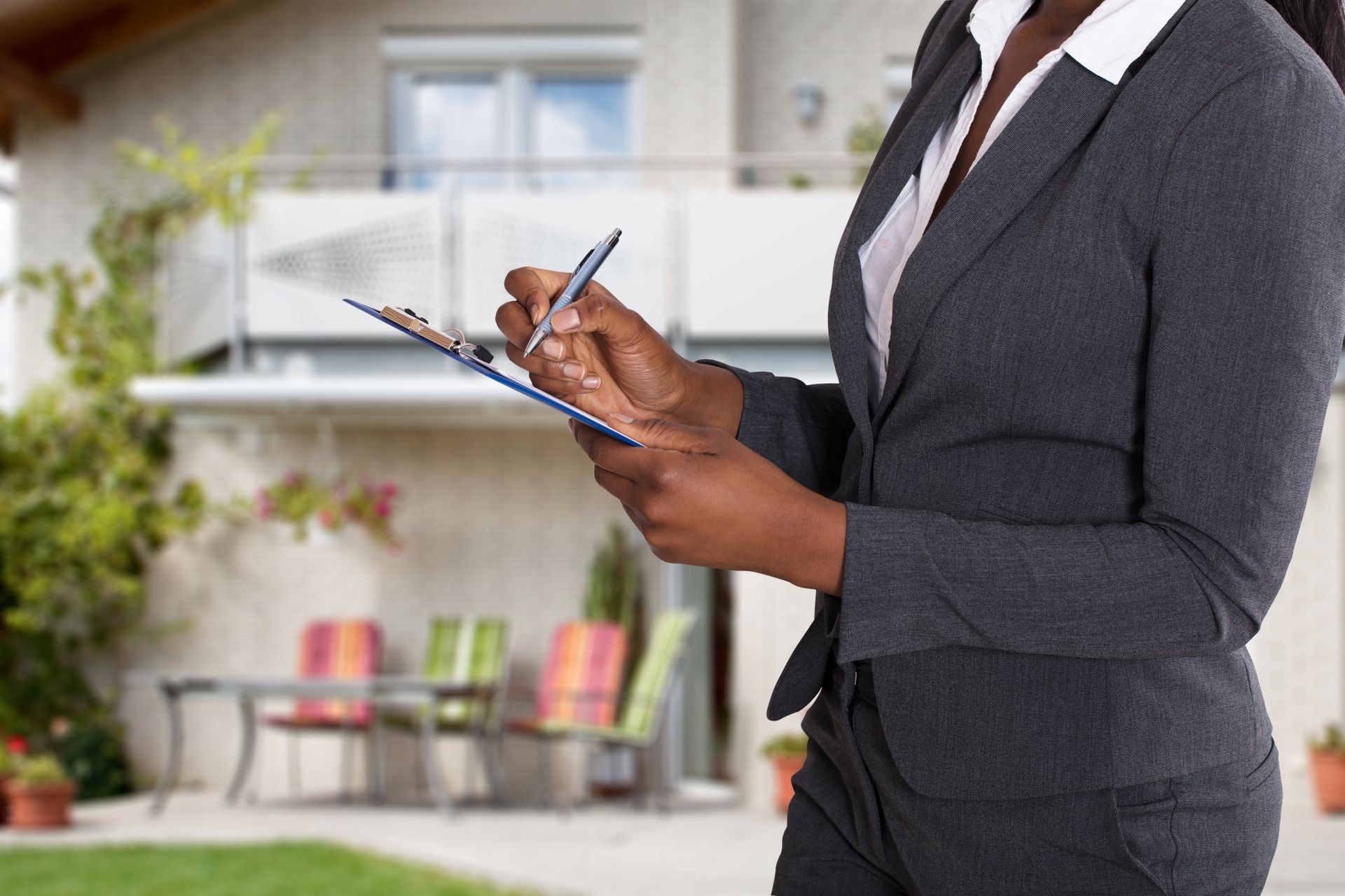 Real estate agent viewing property listings on custom website