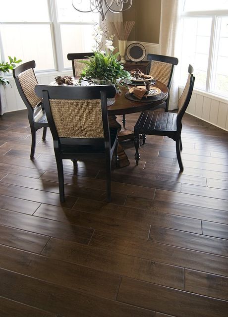 Ding Room refinished floors woth dark stain