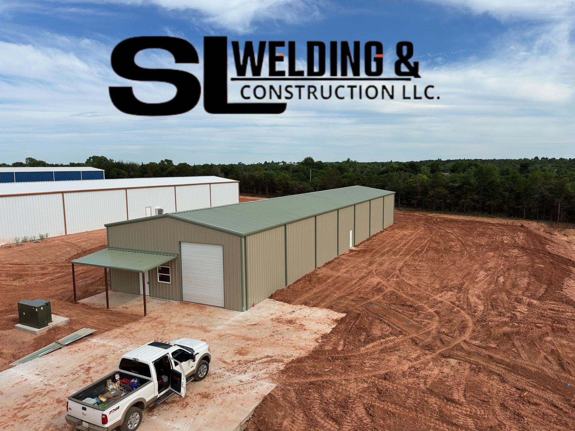An aerial view of a welding and construction llc building