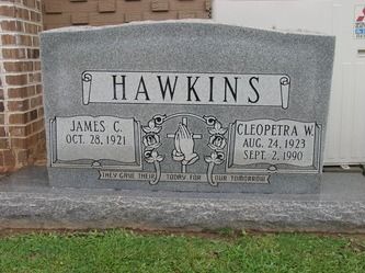 Gray granite tombstone with 