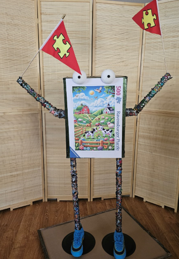 Greenie - Part of the Jigsaw art work creating life with jigsaw puzzles. The four piece are from Jodi Jill, artist