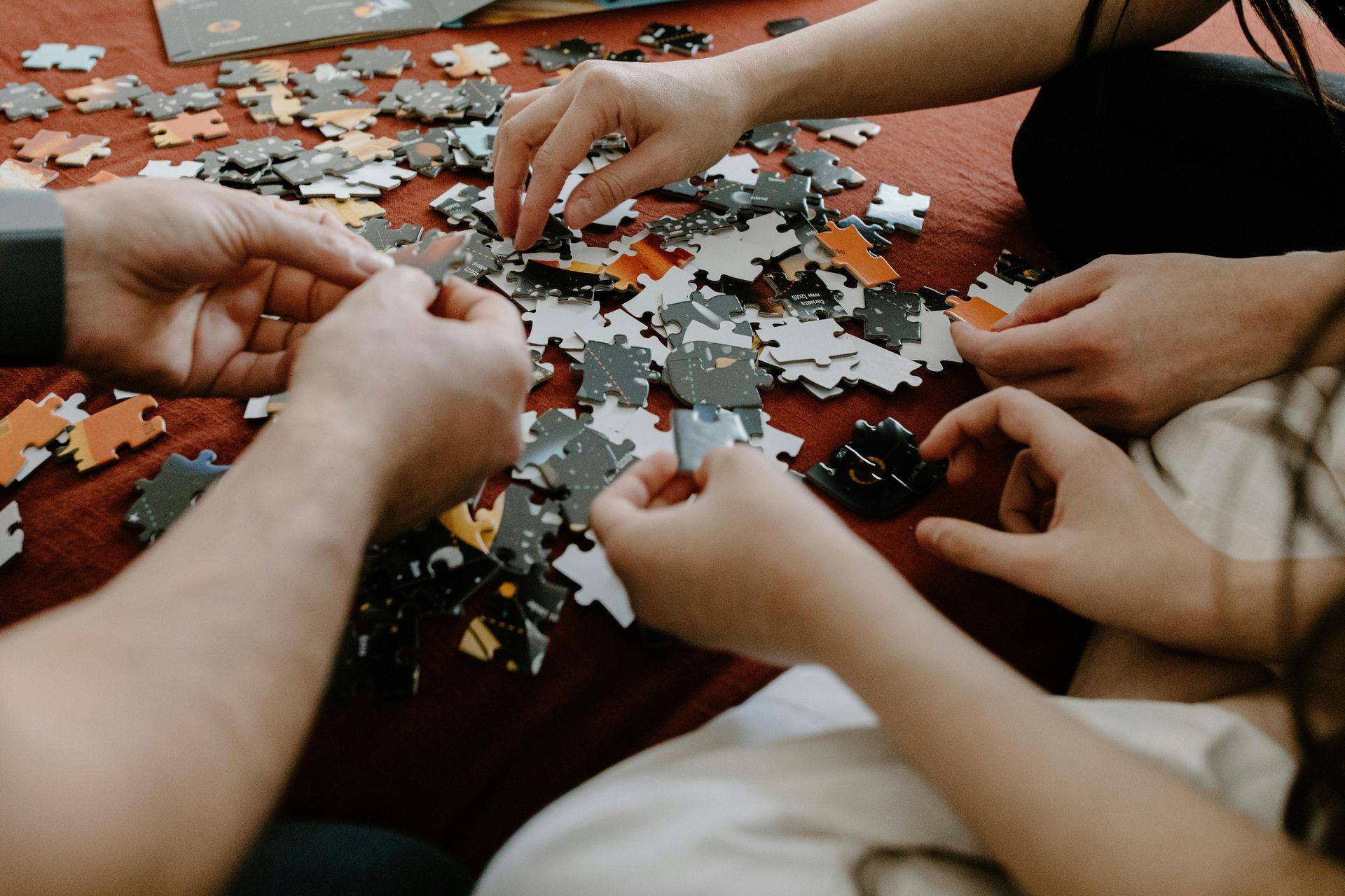 Kids sort jigsaw puzzle pieces for puzzle piece crafts