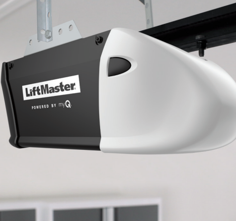 LiftMaster garage door opener, black and white, mounted on ceiling.