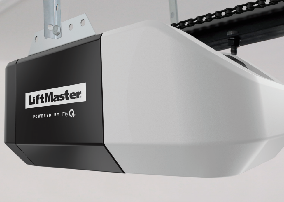 LiftMaster garage door opener in white and black, mounted on a garage ceiling.