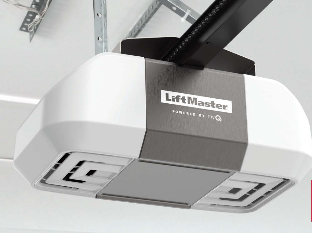 White LiftMaster garage door opener mounted on ceiling.