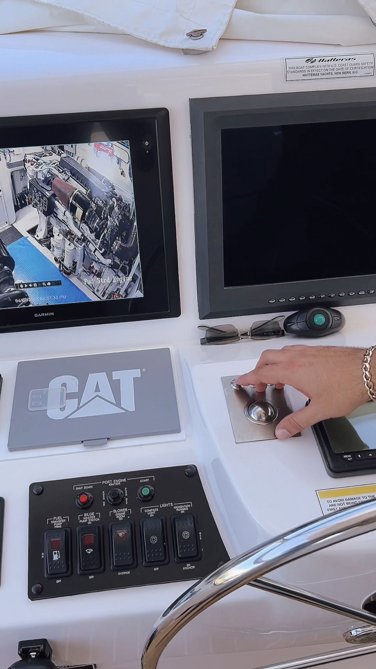 A person is using a computer on a boat.