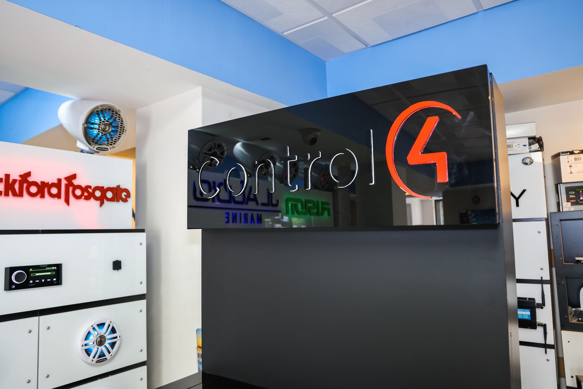A room with a sign that says control 4 on it