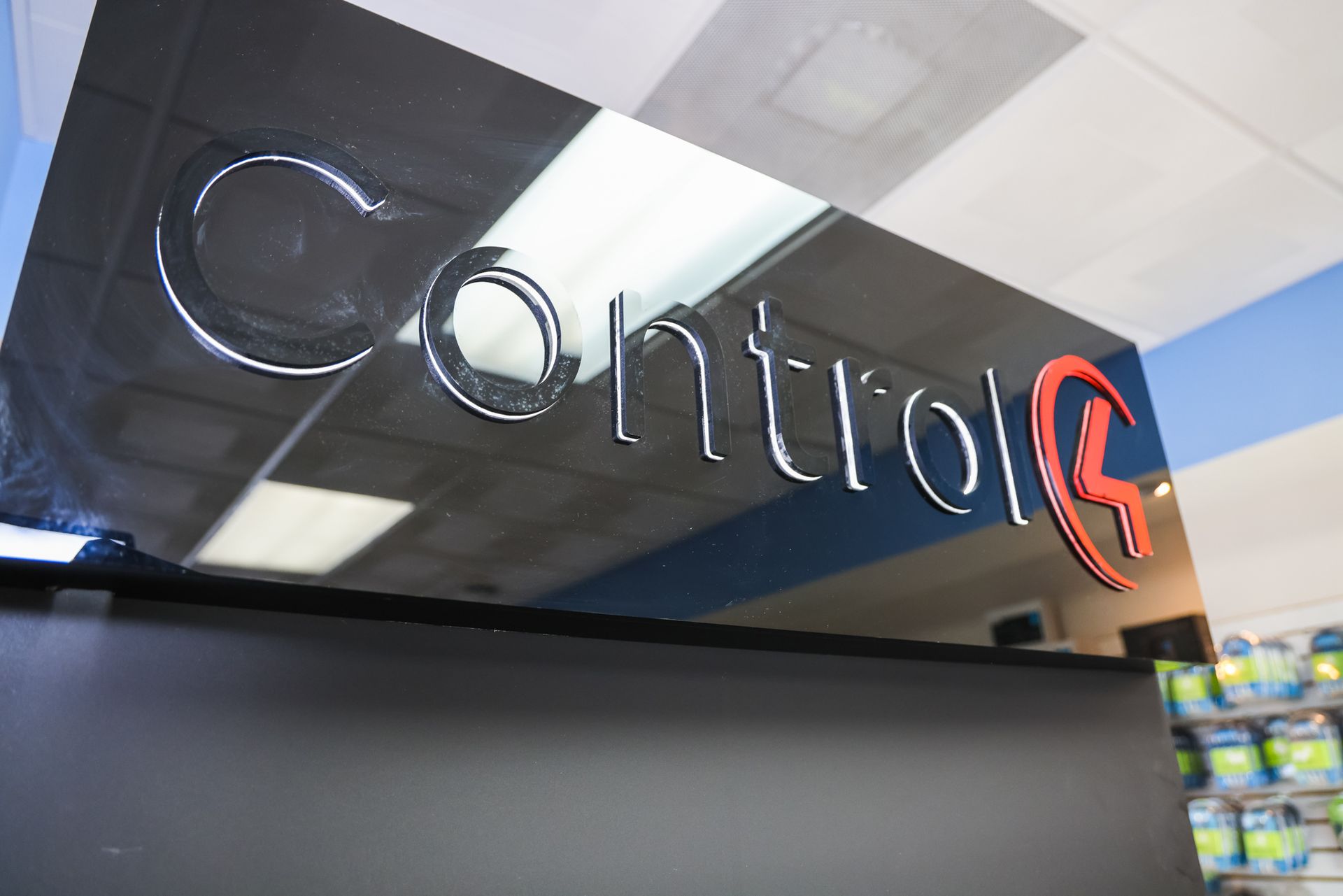 A sign in a store that says control on it