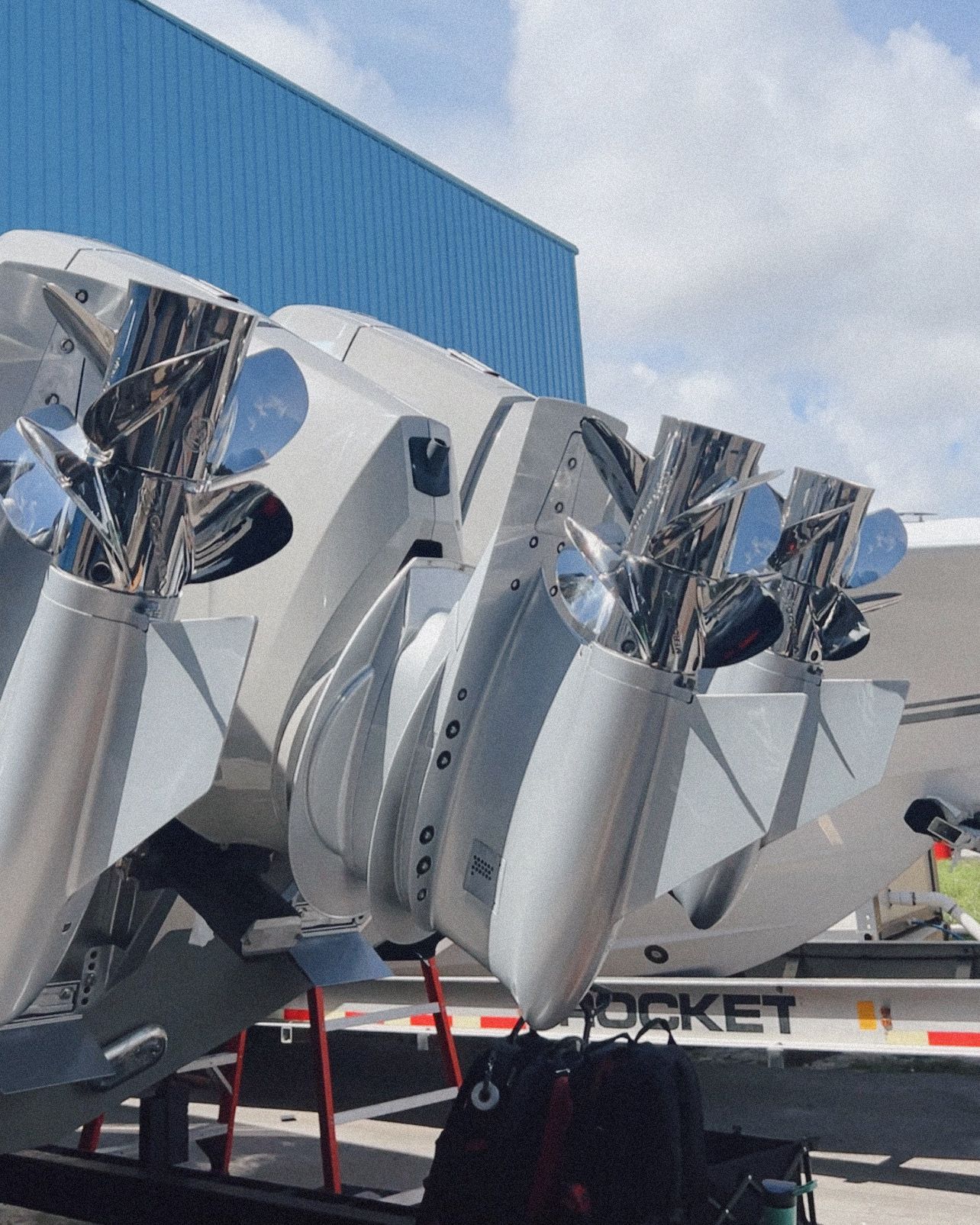 A jet engine is sitting on a trailer that says rocket