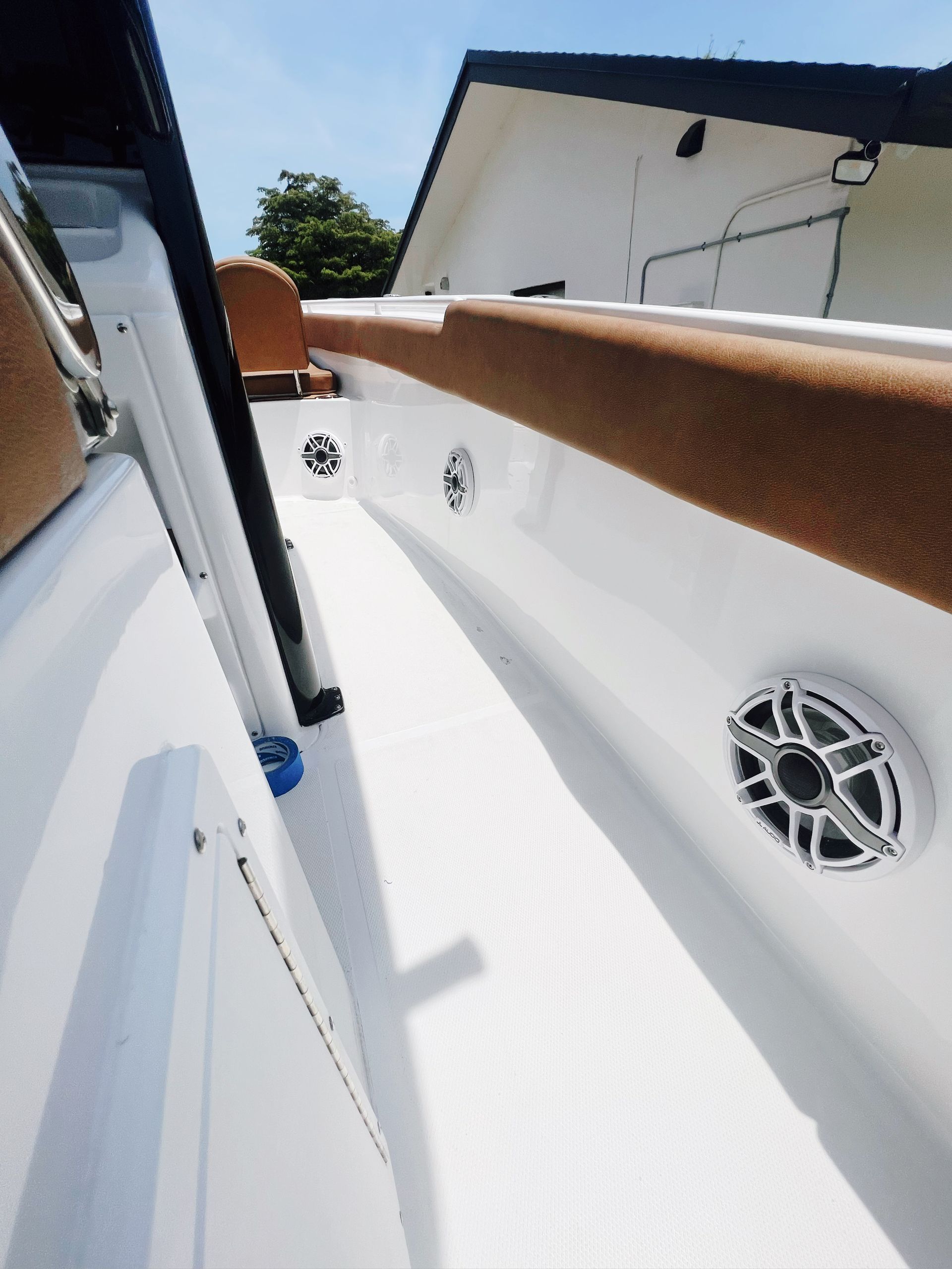 A boat with speakers on the side of it