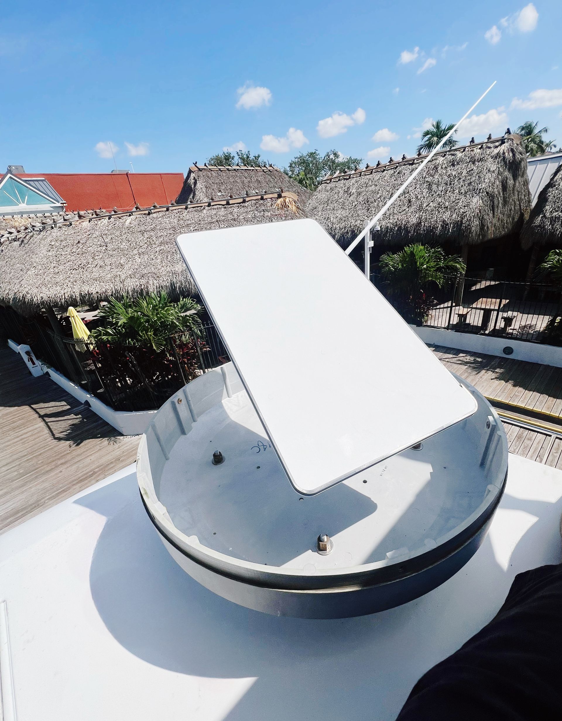 A white object is sitting on top of a white table