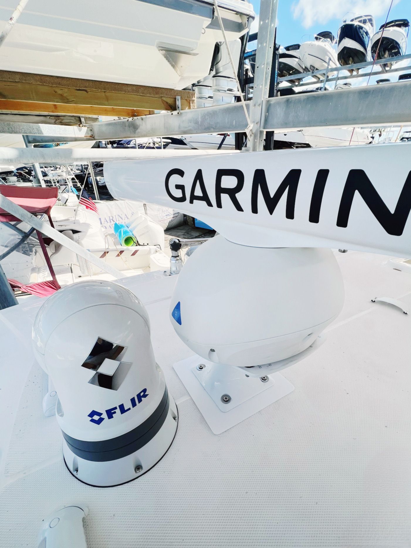 A garmin sign is on the side of a boat.