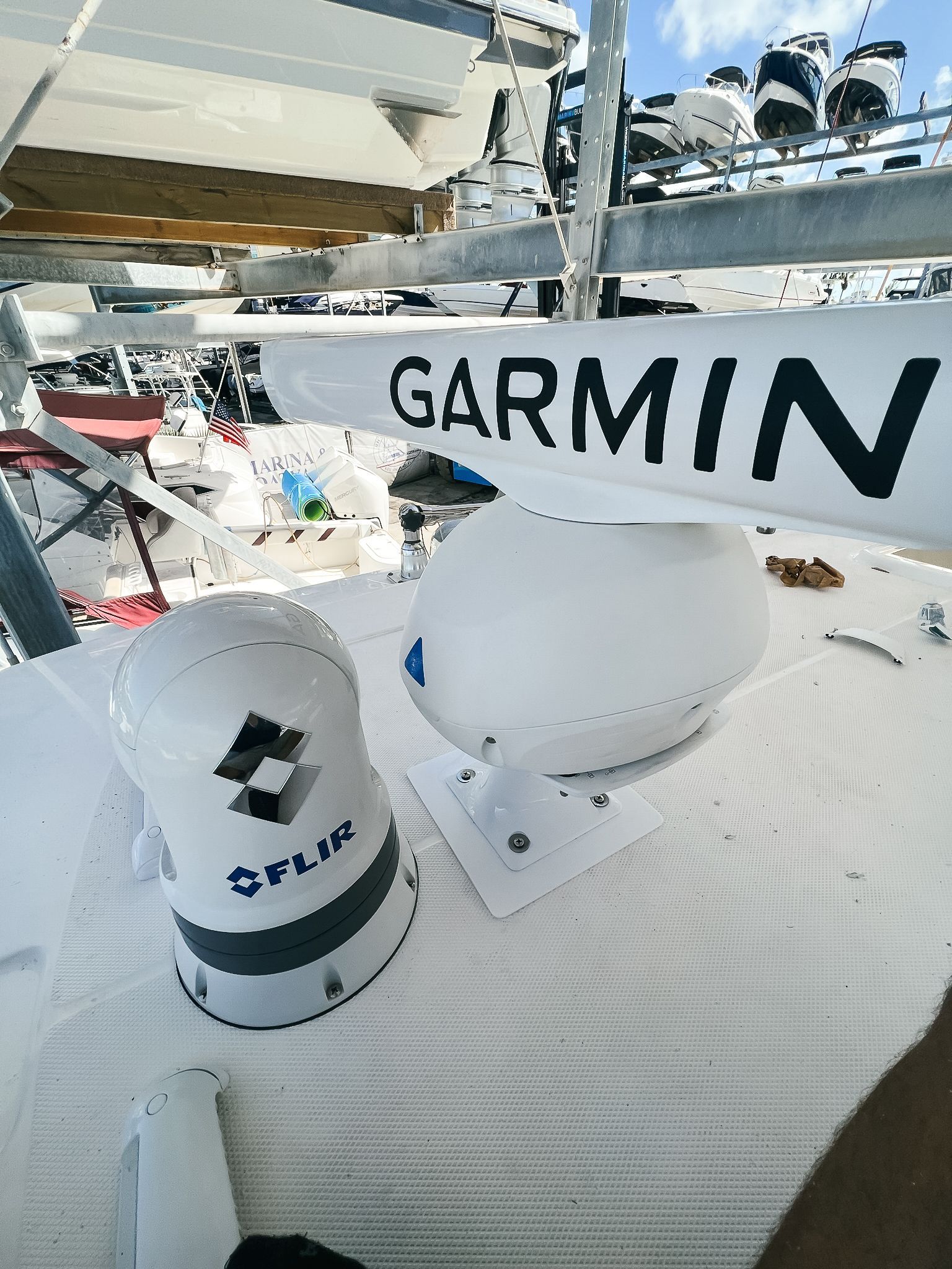 The word garmin is on the side of a boat