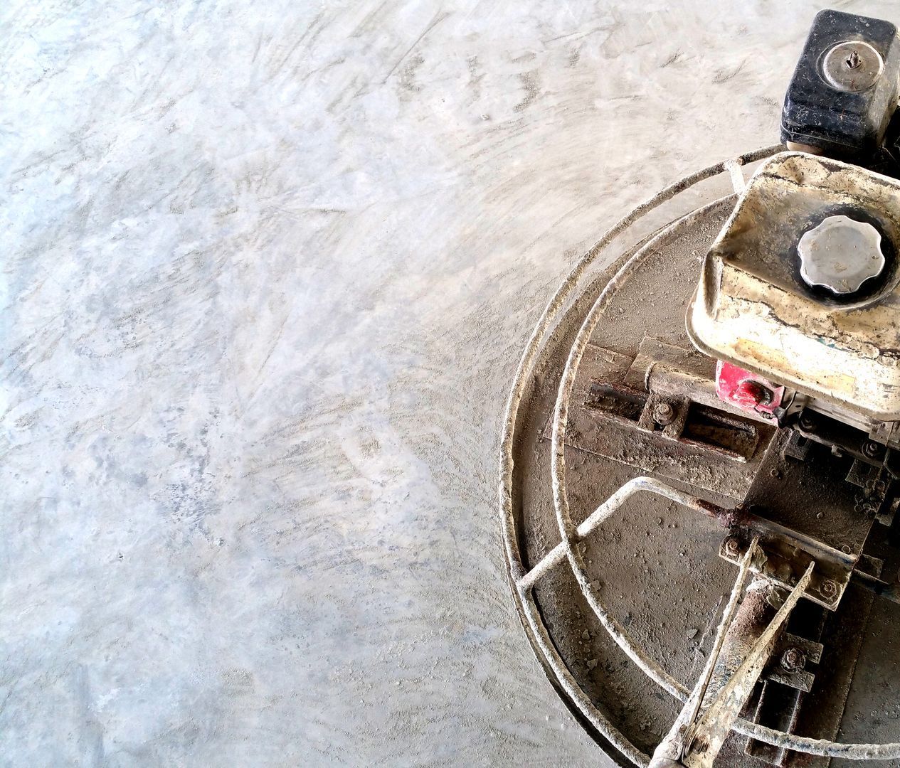 A close up of a machine on a concrete floor