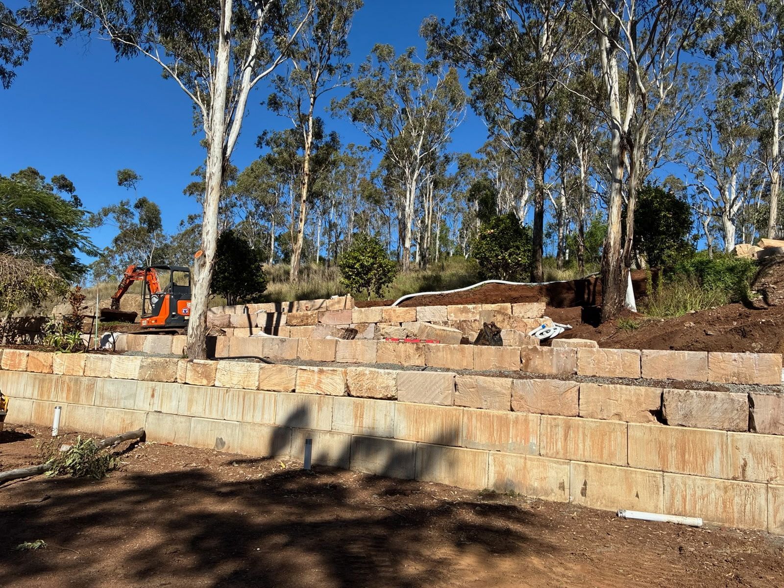 Terraced Stone Retaining Wall Under Construction — Barry's Recycling in Yatala, QLD