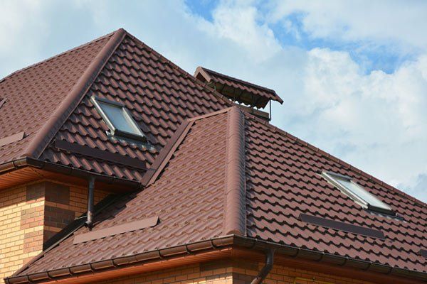 Roof Repairs Near Me — Roofing construction with attic skylight in Sparks, NV