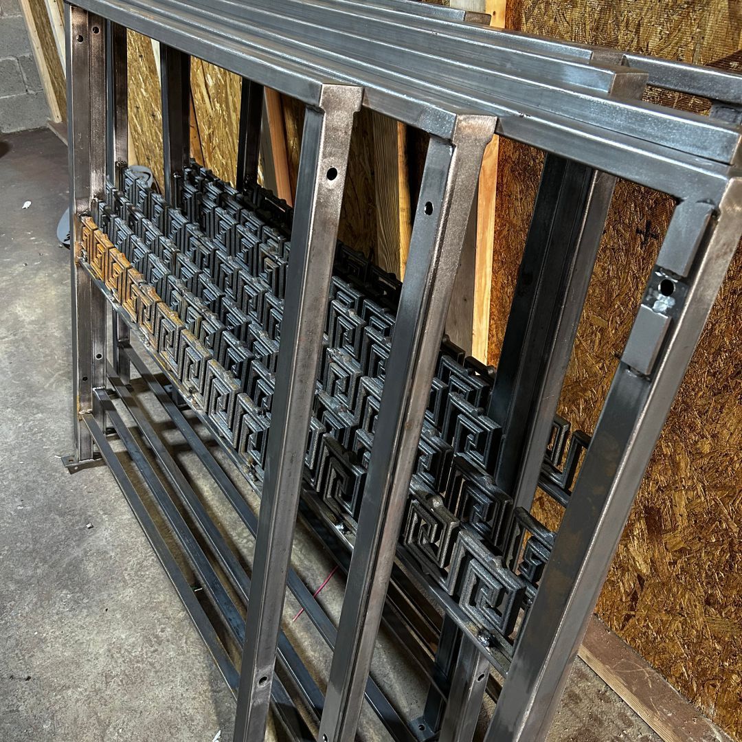 A bunch of metal pieces are stacked on top of each other.