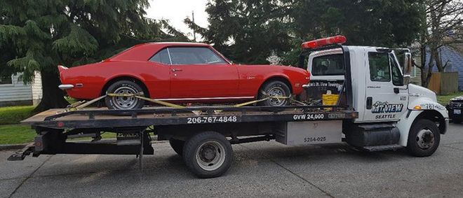 Towing — Red Car on Tow Truck in Seattle, WA