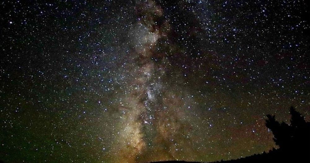 A starry night sky with the milky way visible