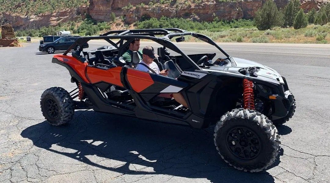 A red and black UTV