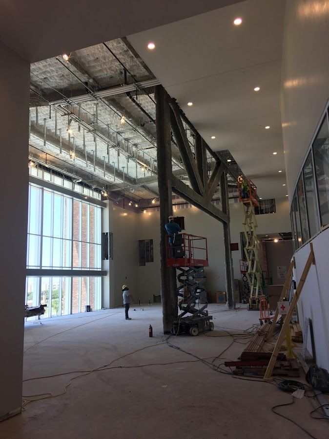 A large room with a lot of windows is being built at Kyle Field