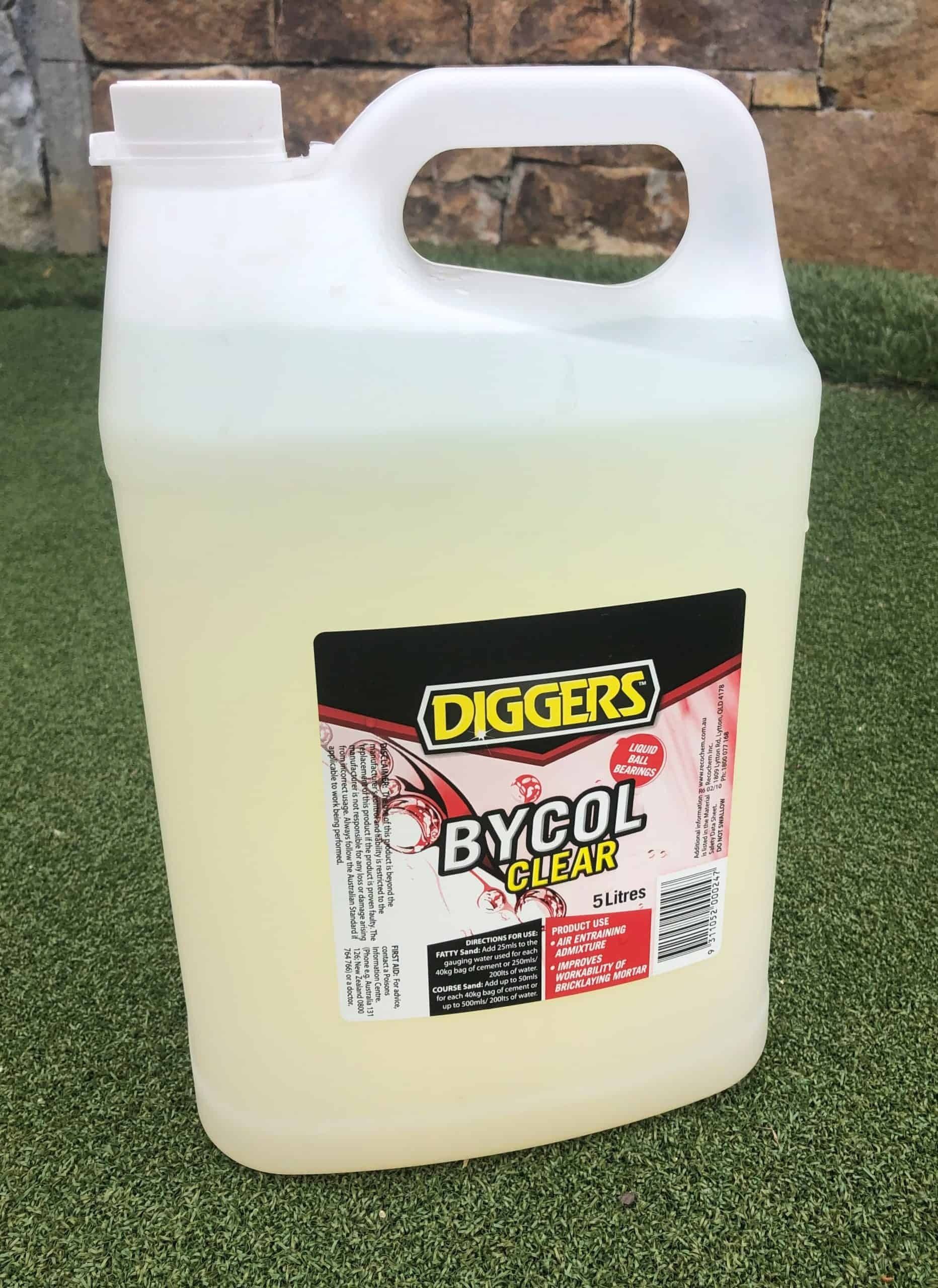 White Plastic Diggers Bygol Clear Container on Green Artificial Turf — Hunter Valley Bricks & Pavers in Scone, NSW