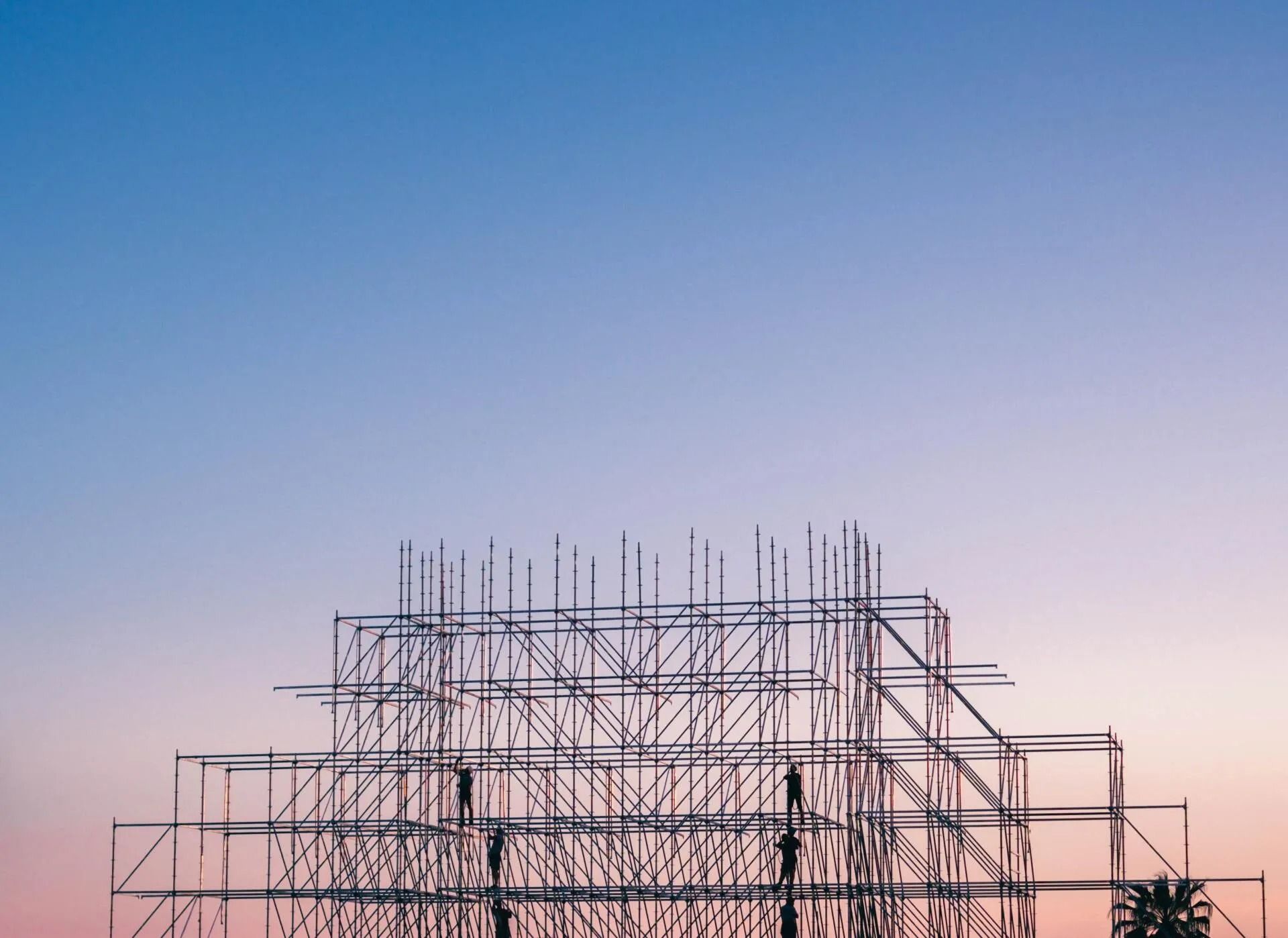 Scaffolding Against a Gradient Sky of Pink and Blue — Hunter Valley Bricks & Pavers in Singleton, NSW