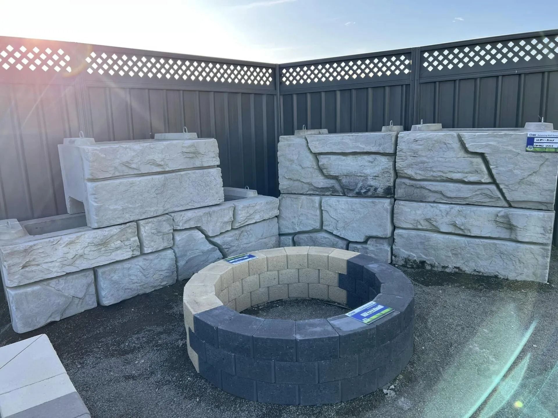 Fire Pit and Retaining Wall Blocks Displayed Outdoors — Hunter Valley Bricks & Pavers in Scone, NSW