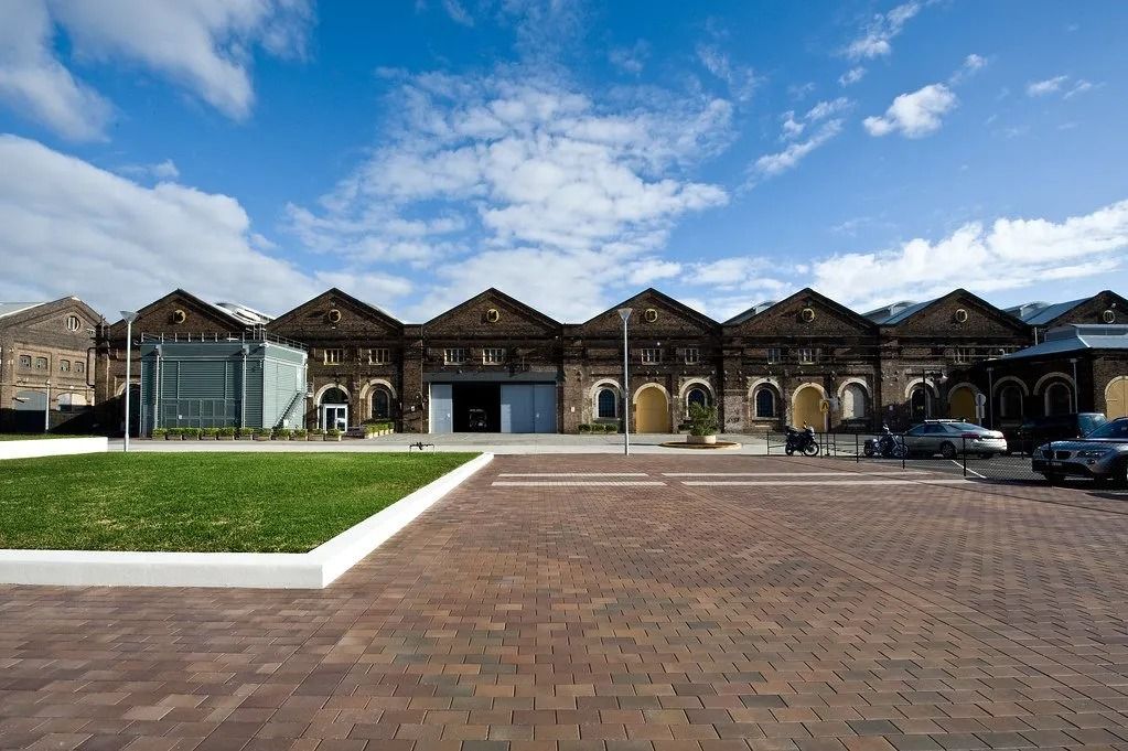 Row of Historic Brick Buildings With Gabled Roofs — Hunter Valley Bricks & Pavers in Scone, NSW