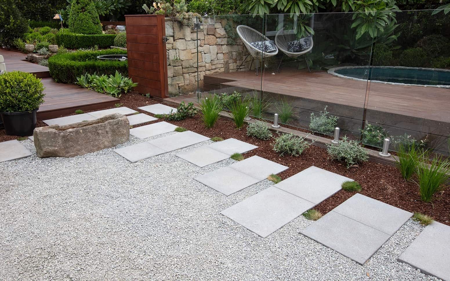 Stone Path Through Gravel and Flowerbeds Leads to a Pool — Hunter Valley Bricks & Pavers in Scone, NSW