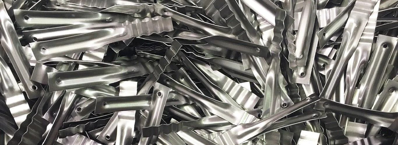 Pile of Shiny, Silver-coloured Metal Pieces — Hunter Valley Bricks & Pavers in Scone, NSW
