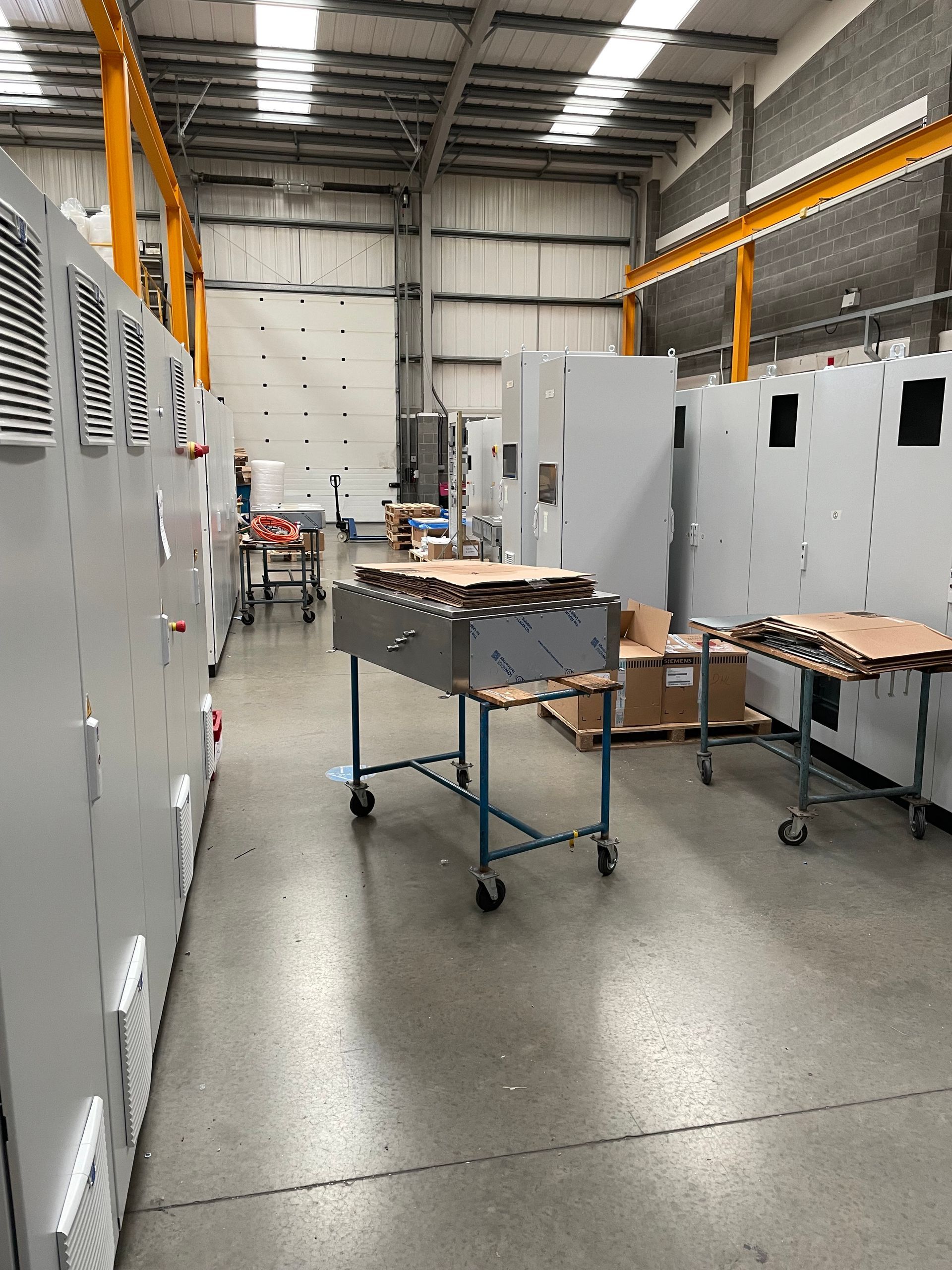 Control panels awaiting despatch